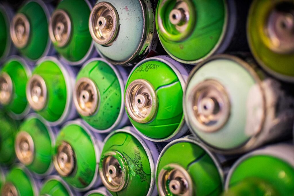 closeup shot of stacked spray cans paint 2023 11 27 05 03 04 utc.jpg